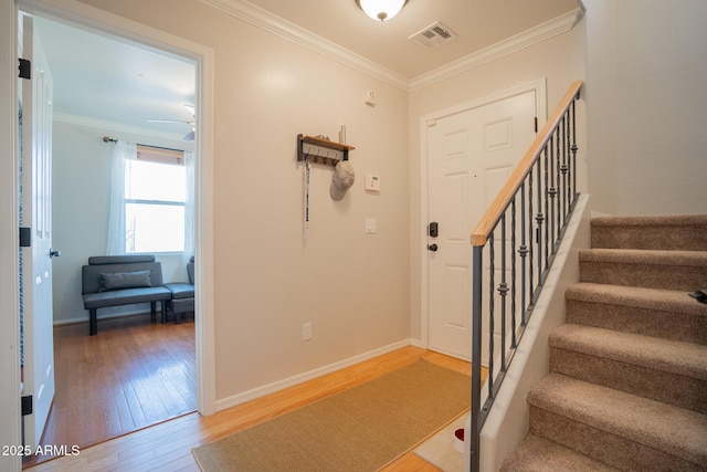 34979 N 30th Ave, Phoenix, AZ 85086 - foyer with light wood-type flooring, ornamental molding, stairway, baseboards, and ceiling fan