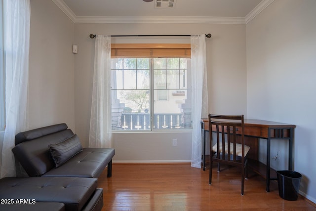 34979 N 30th Ave, Phoenix, AZ 85086 - sitting room featuring wood finished floors, baseboards, and ornamental molding