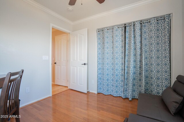 34979 N 30th Ave, Phoenix, AZ 85086 - living area featuring ceiling fan, wood finished floors, crown molding, and baseboards