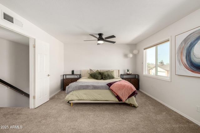 14235 N 26th Ln, Phoenix, AZ 85023 - carpeted bedroom featuring baseboards and a ceiling fan