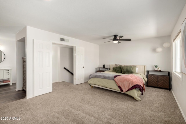 14235 N 26th Ln, Phoenix, AZ 85023 - carpeted bedroom featuring ceiling fan and baseboards