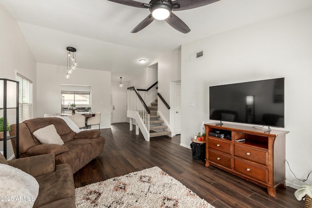 14235 N 26th Ln, Phoenix, AZ 85023 - living area featuring stairway, dark wood-style flooring, a ceiling fan, and vaulted ceiling