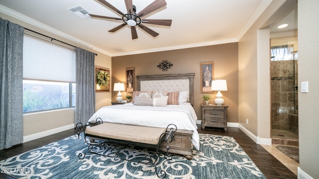 bedroom featuring ornamental molding, dark wood-type flooring, multiple windows, and ceiling fan