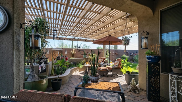 view of patio featuring a pergola