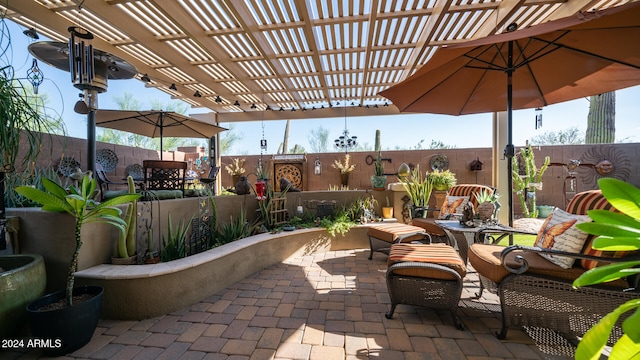 view of patio / terrace featuring outdoor lounge area and a pergola