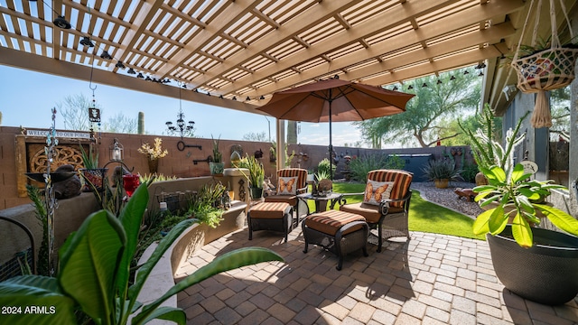 view of patio / terrace featuring a pergola