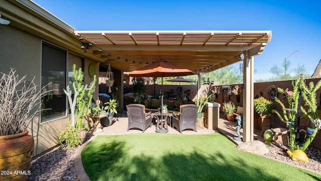 view of patio featuring a pergola