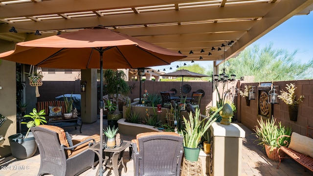 view of patio featuring a pergola