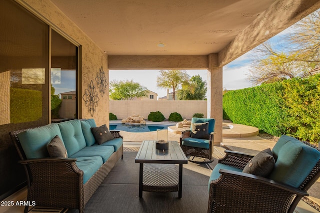 view of patio with an outdoor living space and a fenced in pool