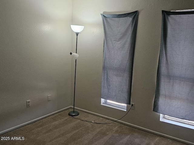 3807 W Mitchell Dr, Phoenix, AZ 85019 - carpeted spare room featuring baseboards