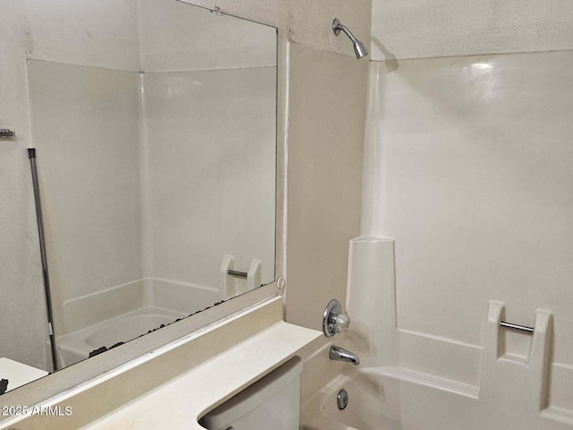 3807 W Mitchell Dr, Phoenix, AZ 85019 - bathroom featuring tub / shower combination, toilet, and vanity