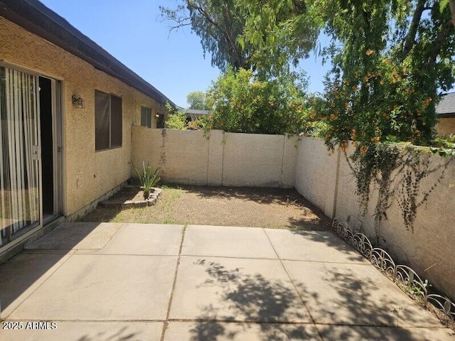 3807 W Mitchell Dr, Phoenix, AZ 85019 - fenced backyard with a patio area