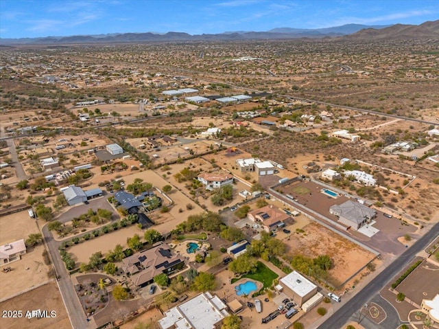 drone / aerial view with a residential view and a mountain view