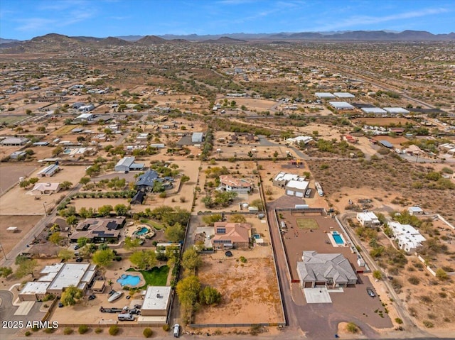 birds eye view of property with a residential view and a mountain view