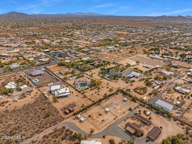 bird's eye view with a mountain view