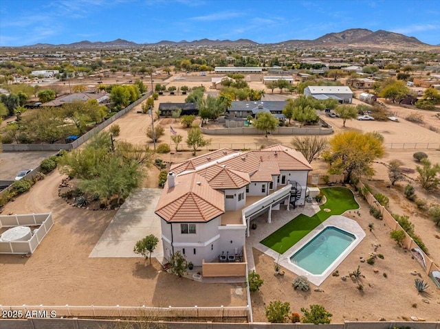 drone / aerial view with a residential view and a mountain view