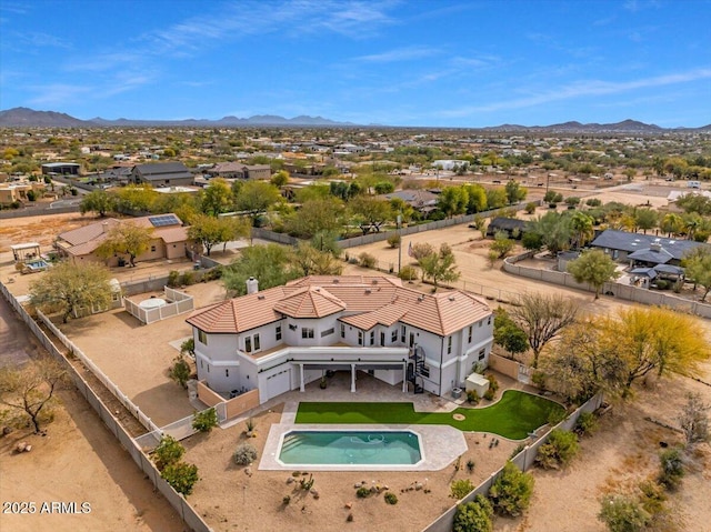 bird's eye view with a residential view and a mountain view