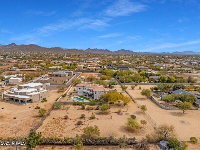 drone / aerial view with a residential view and a mountain view