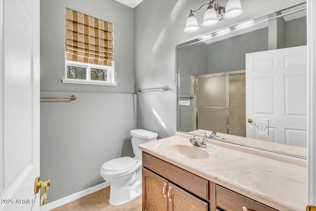 full bathroom with baseboards, toilet, a shower with shower door, tile patterned flooring, and vanity