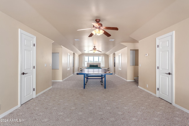 recreation room with ceiling fan and light colored carpet