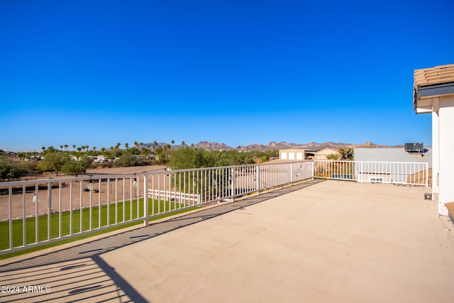 view of patio / terrace with a mountain view