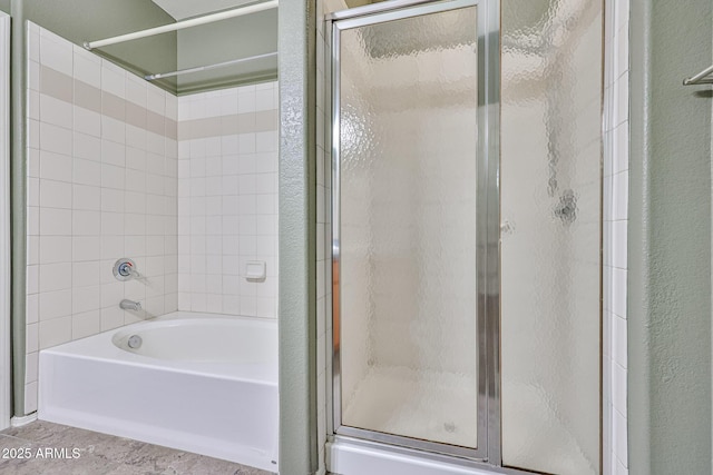 bathroom with an enclosed shower and a washtub