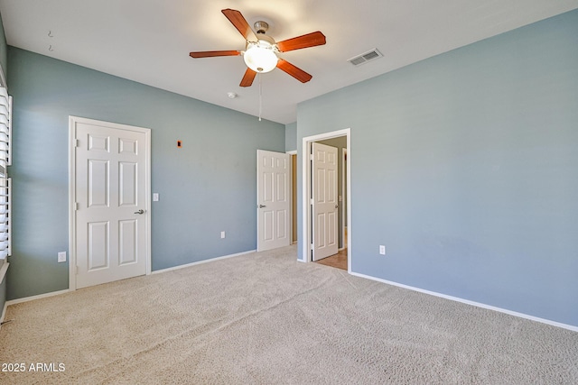 unfurnished bedroom featuring visible vents, ceiling fan, baseboards, and carpet floors