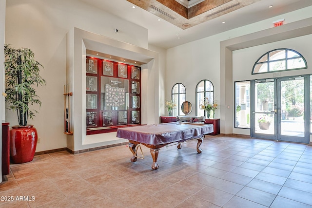 game room with baseboards, a towering ceiling, pool table, and tile patterned flooring