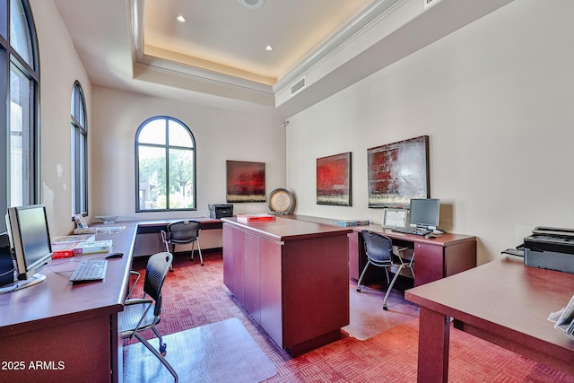 office featuring recessed lighting, visible vents, and a raised ceiling