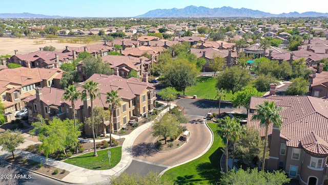 drone / aerial view with a mountain view and a residential view