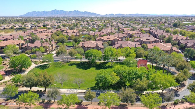 birds eye view of property with a residential view and a mountain view