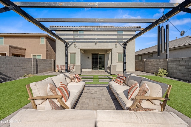 view of patio / terrace with an outdoor hangout area and a pergola