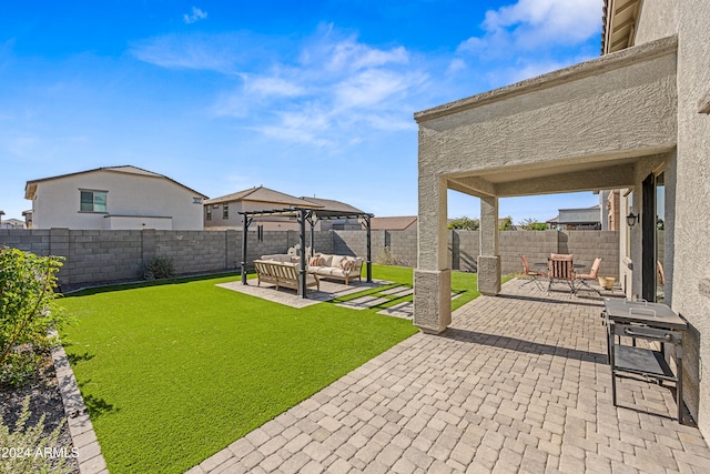 view of yard with a pergola, a patio area, and an outdoor hangout area