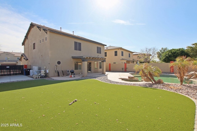 rear view of property with a patio area, a fenced backyard, a pergola, and stucco siding