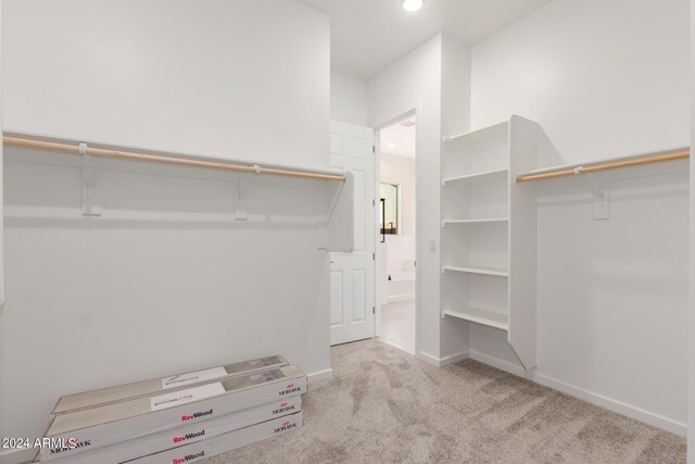 bathroom with vanity, plus walk in shower, and tile patterned floors