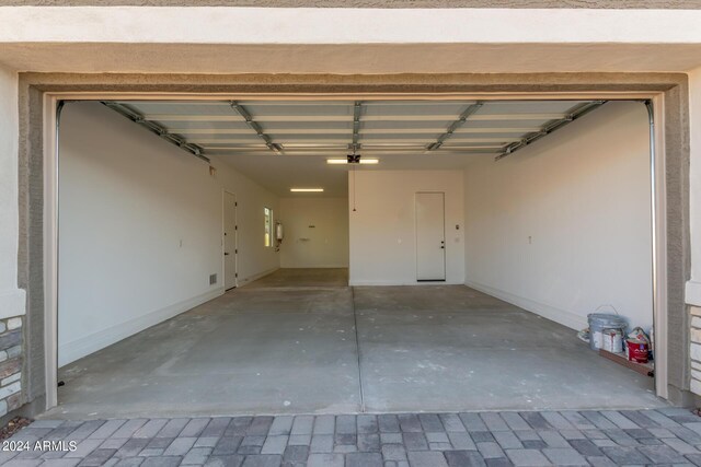 unfurnished room with light wood-type flooring