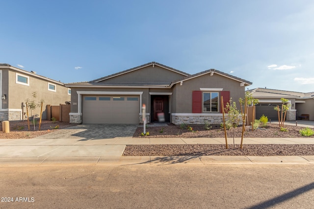 view of front of property featuring a garage