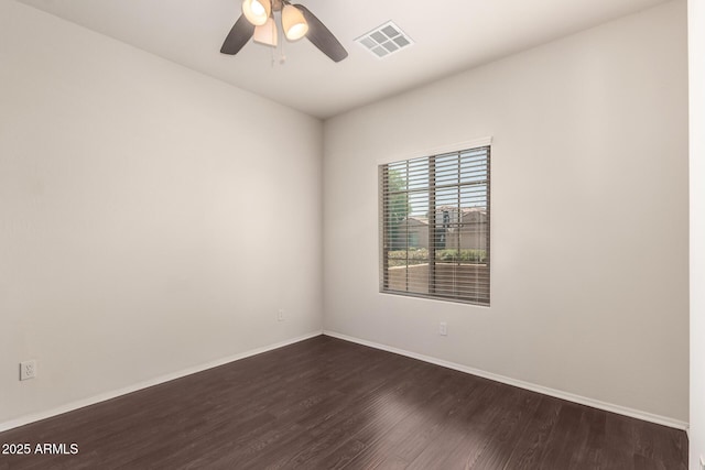 10910 E Sebring Ave, Mesa, AZ 85212 - unfurnished room featuring dark wood-style flooring and a ceiling fan