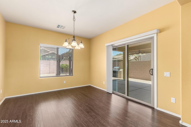 10910 E Sebring Ave, Mesa, AZ 85212 - unfurnished room with wood finished floors and a chandelier