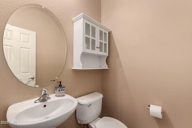 10910 E Sebring Ave, Mesa, AZ 85212 - half bath featuring a sink and toilet