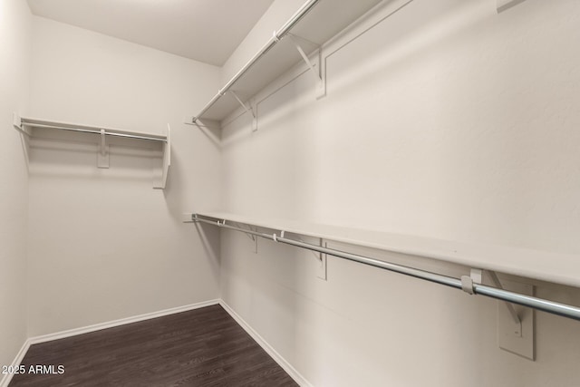 10910 E Sebring Ave, Mesa, AZ 85212 - spacious closet featuring dark wood-style floors