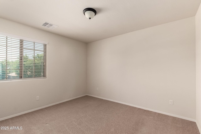 10910 E Sebring Ave, Mesa, AZ 85212 - spare room featuring light colored carpet