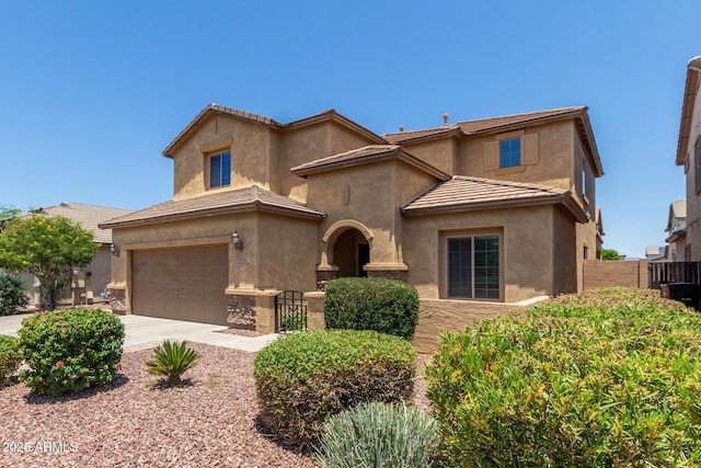 10910 E Sebring Ave, Mesa, AZ 85212 - view of front of home with concrete driveway, stucco siding, an attached garage, and a tiled roof