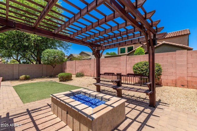 10910 E Sebring Ave, Mesa, AZ 85212 - fenced backyard with a fire pit, a patio area, and a pergola