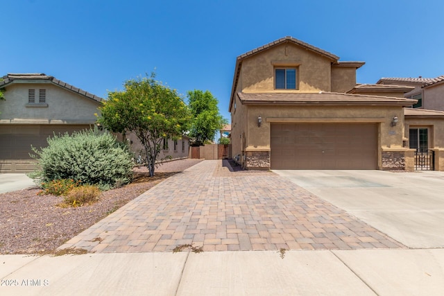 10910 E Sebring Ave, Mesa, AZ 85212 - view of front of property with concrete driveway, stucco siding, stone siding, and a tiled roof