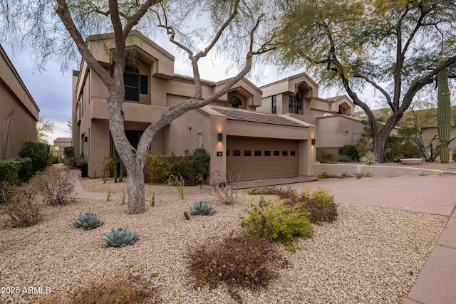 view of front of property featuring a garage