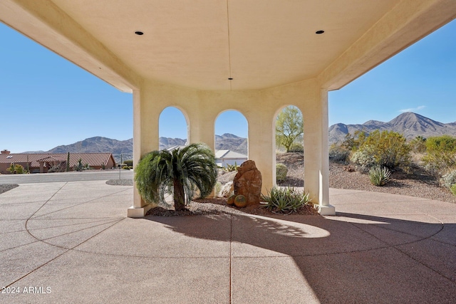 view of patio / terrace with a mountain view