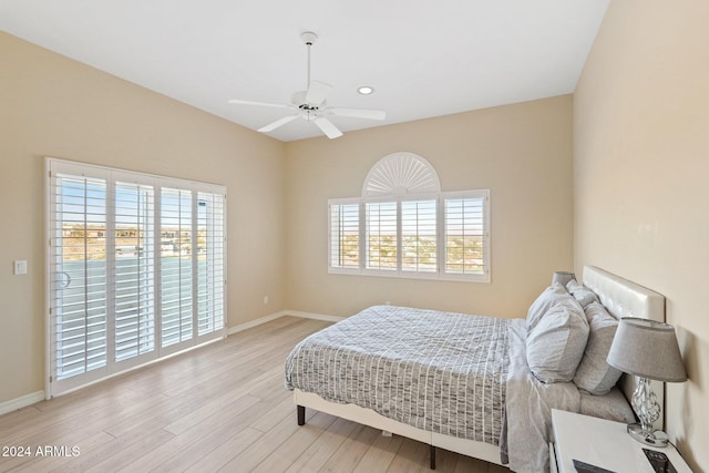 bedroom featuring ceiling fan and light hardwood / wood-style flooring