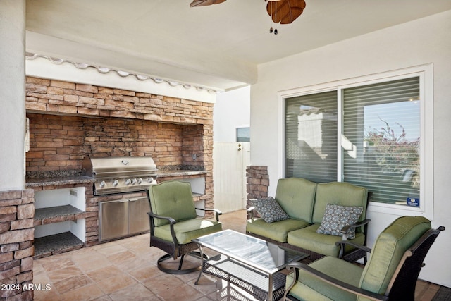 view of patio / terrace featuring an outdoor living space, area for grilling, and a grill