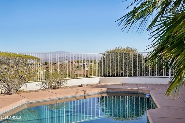 view of pool featuring a mountain view